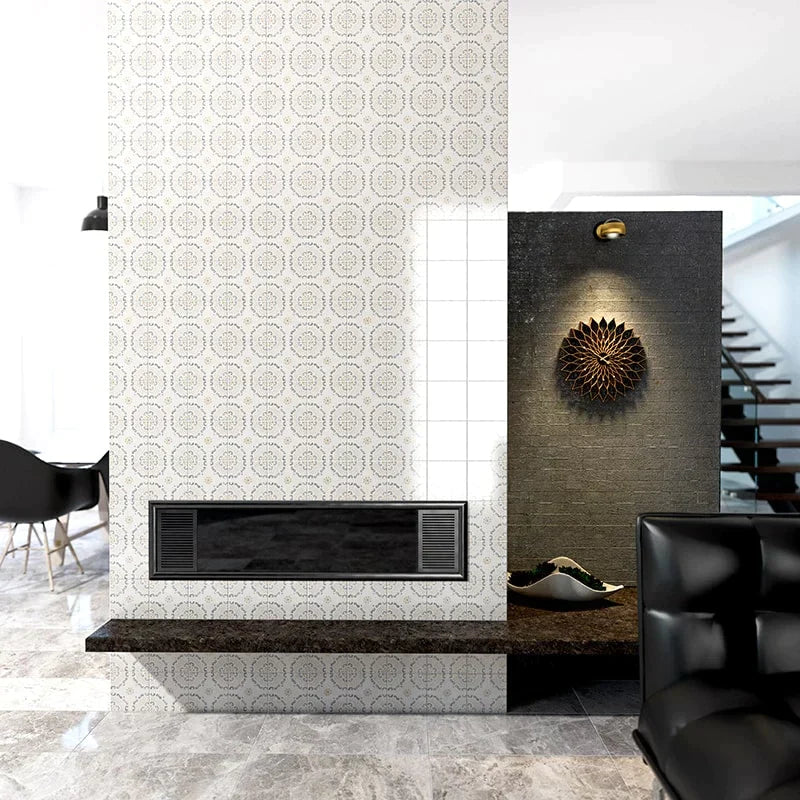 A chic interior showcases a striking ceramic wall adorned with Marsala Bianco tiles featuring intricate geometric patterns, creating a luxurious and dynamic focal point beside a modern fireplace.