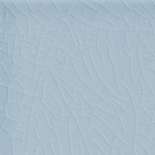 Stellar blue ceramic tile with subtle crackled texture effect for flooring or wall decor.