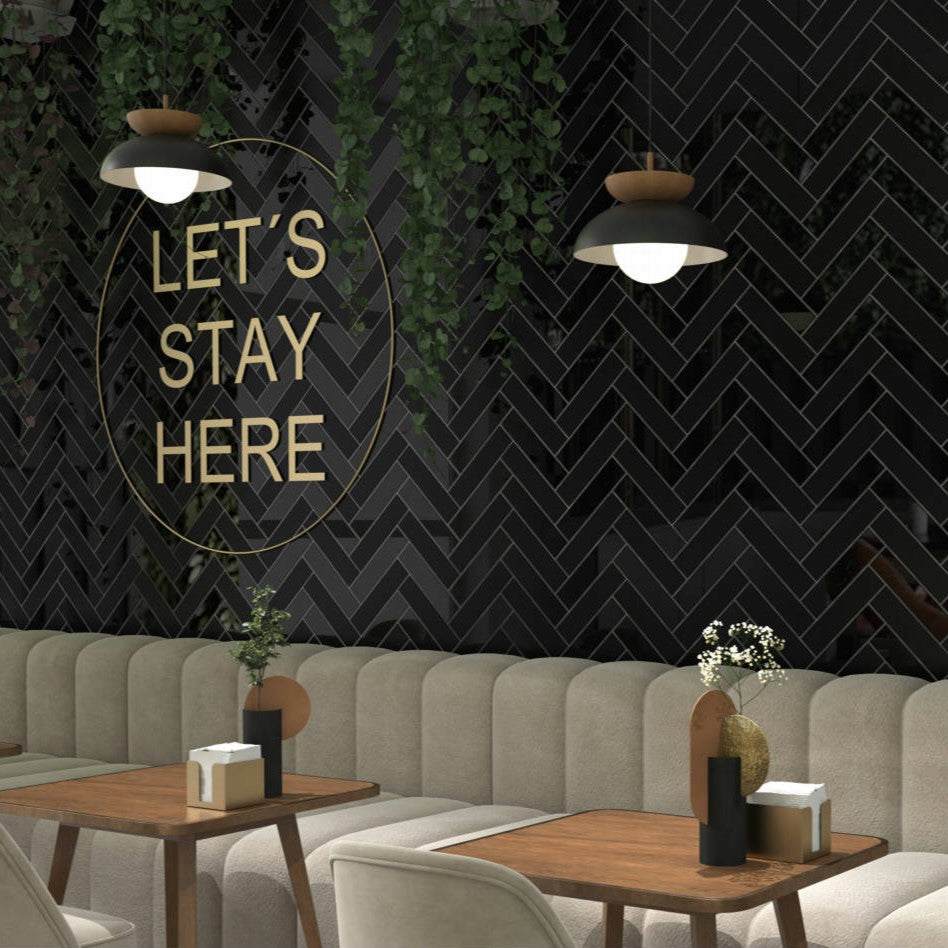 black ceramic tile wall covering in restaurant interior