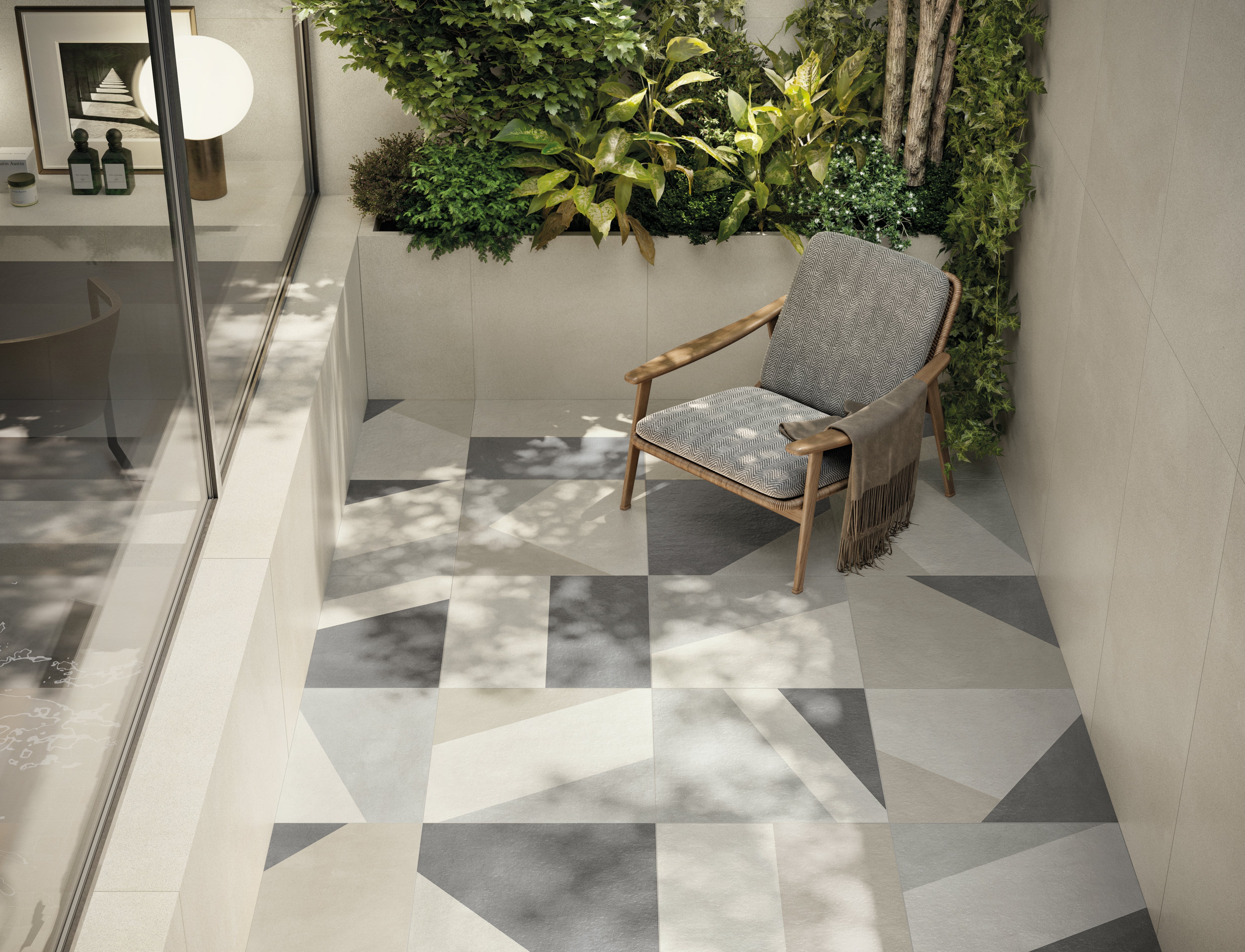 Luxury porcelain tile collection from Surface Group featuring geometric pattern in a modern living space with natural light and greenery.