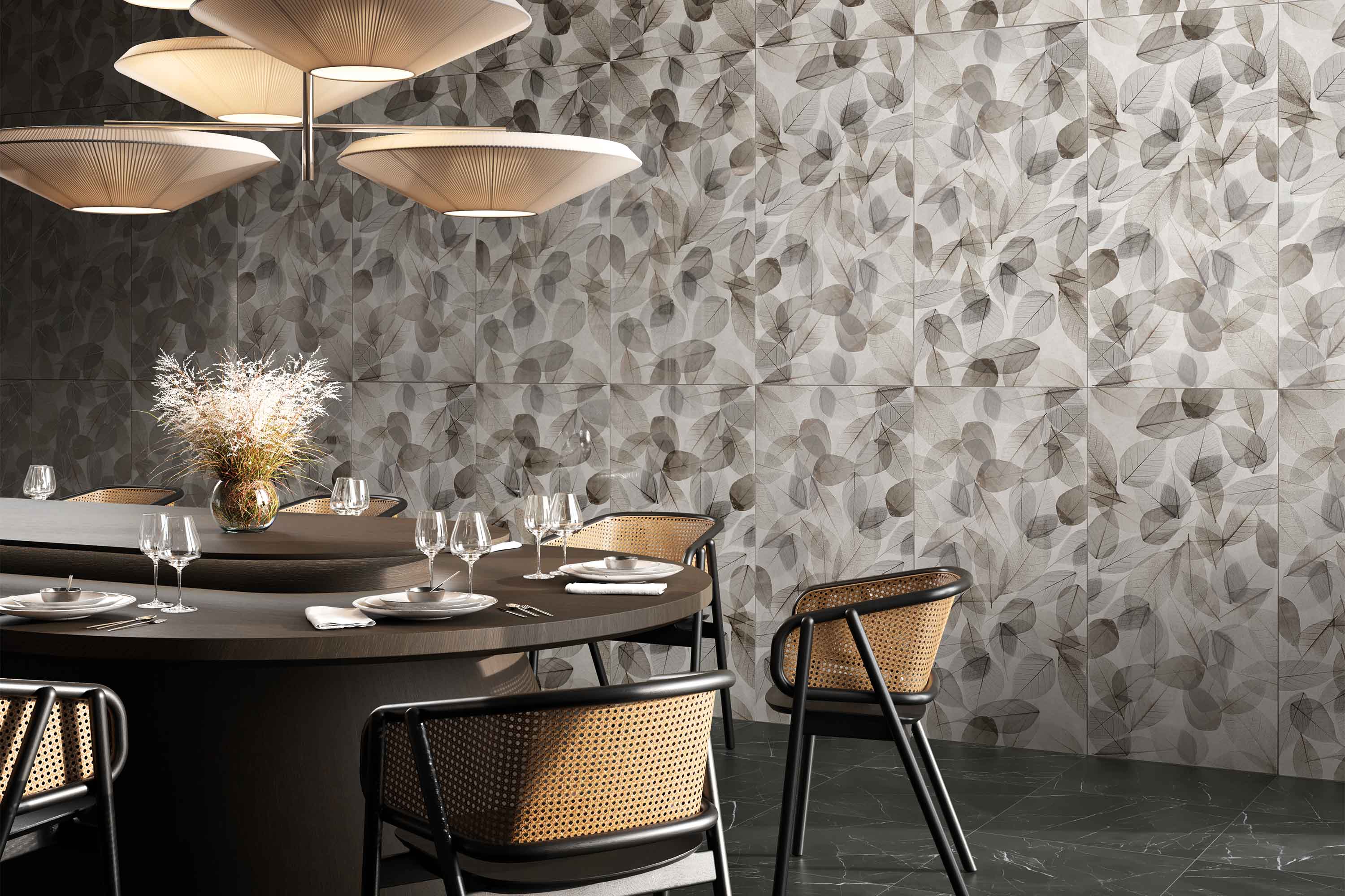 Porcelain tile collection with geometric floral pattern from Surface Group displayed in modern dining room setting