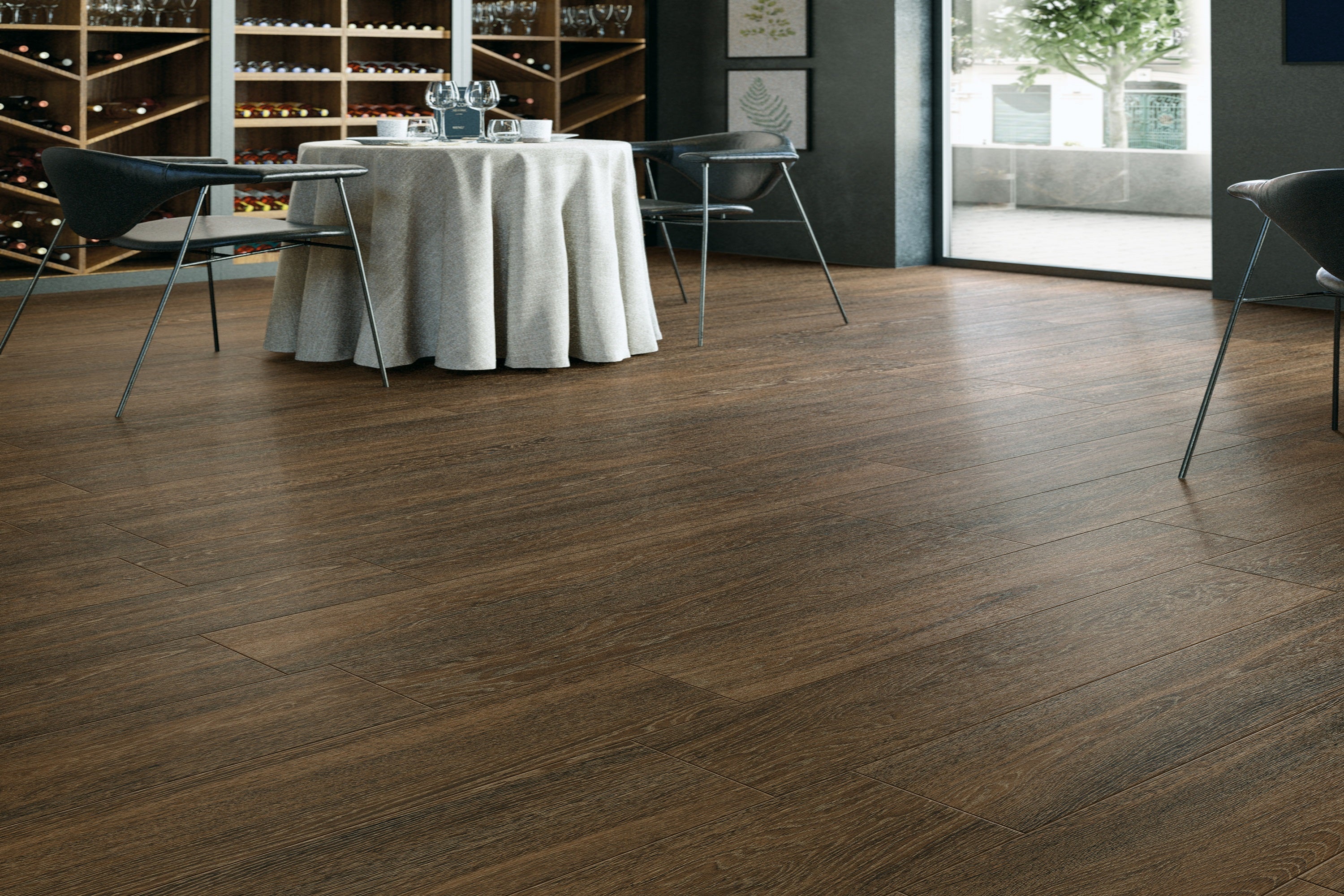Porcelain tile flooring from Surface Group's Spirit Collection with wood-look finish in a modern dining setting