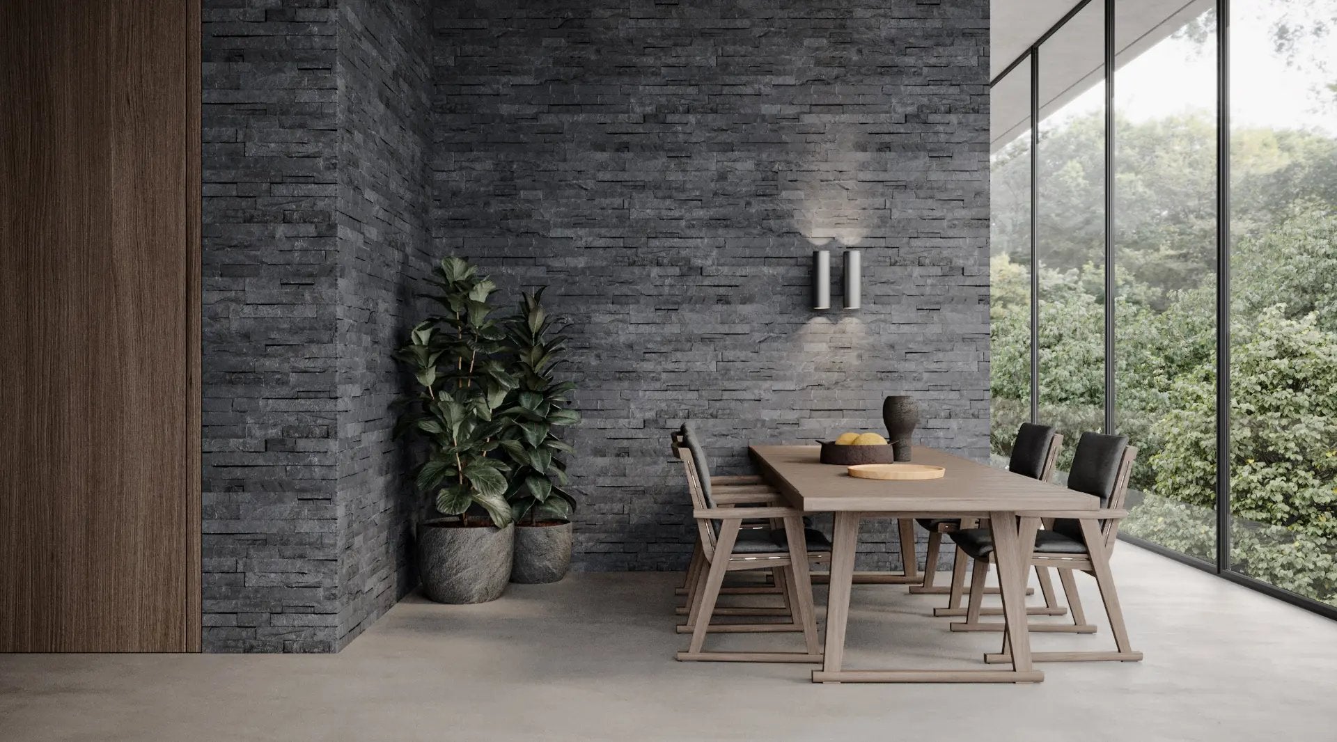 dining room interior with ledger stone walls green plants and a dining table