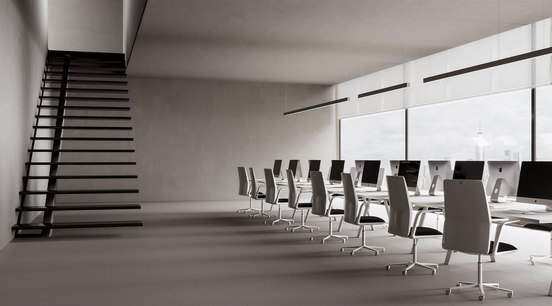 Modern minimalist office interior featuring Anatolia Prima Smoke porcelain tile flooring and wall cladding, with sleek black staircase and contemporary white office furniture.