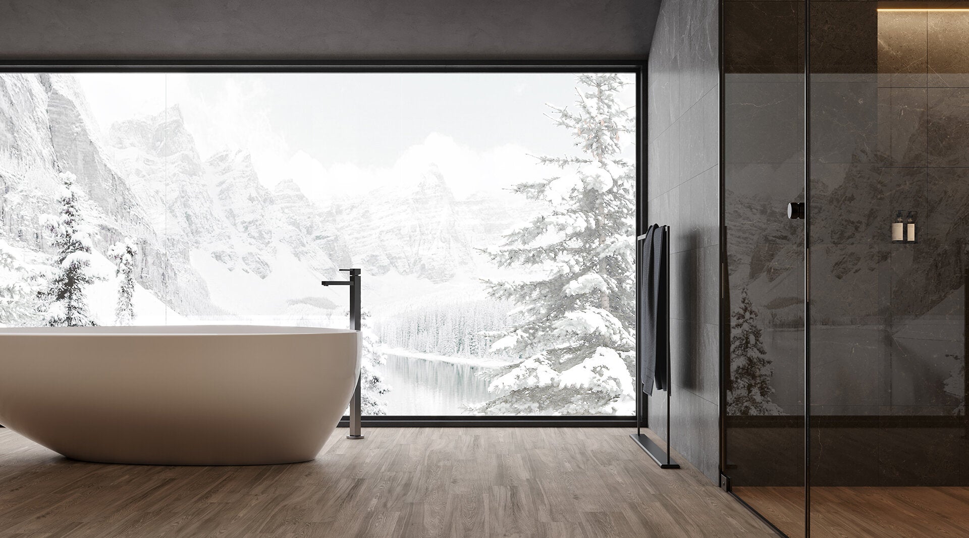 Modern bathroom with Anatolia Vintagewood porcelain tile flooring, freestanding bathtub, and scenic mountain view through large window