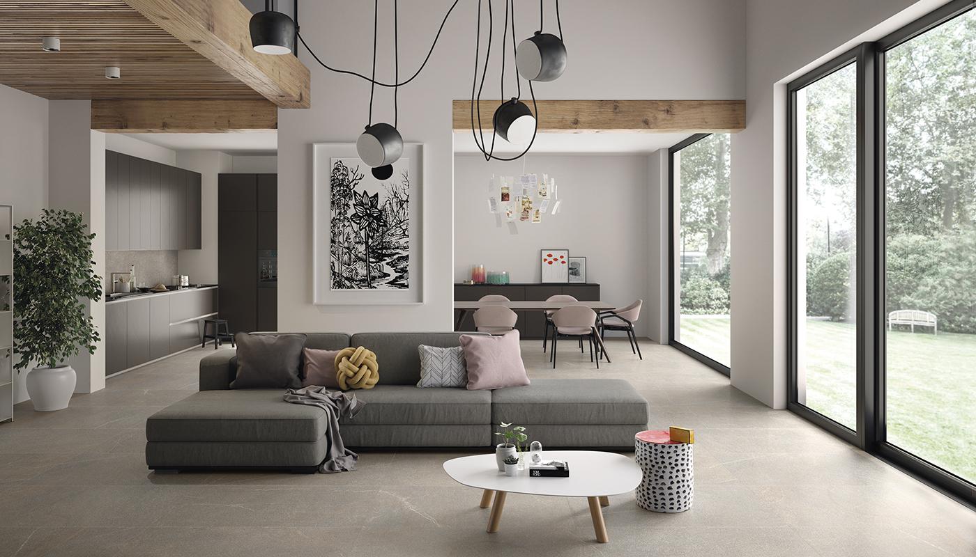Elegant modern living room with Italian Piase porcelain tile flooring, showcasing high-end interior design with natural light and minimalist decor.