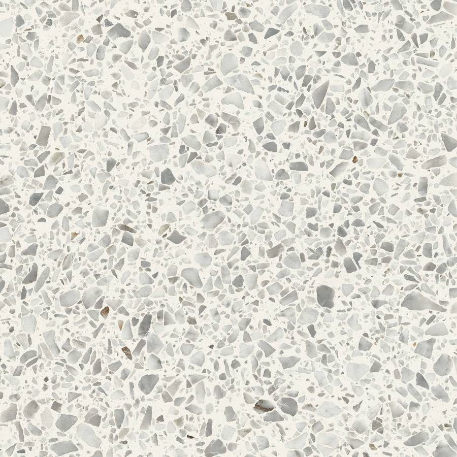 Porcelain terrazzo tile with white background and mixed chips for interior design.