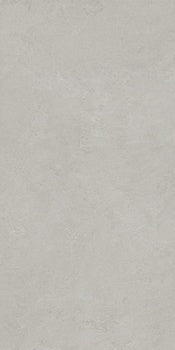 A sleek, matte silver porcelain tile with a refined plaster-like texture, exuding minimalist luxury and serene elegance.