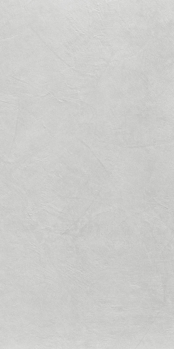 Matte white porcelain tile with subtle 3D texture, evoking fluid resin flooring in a sleek, minimalist large format.