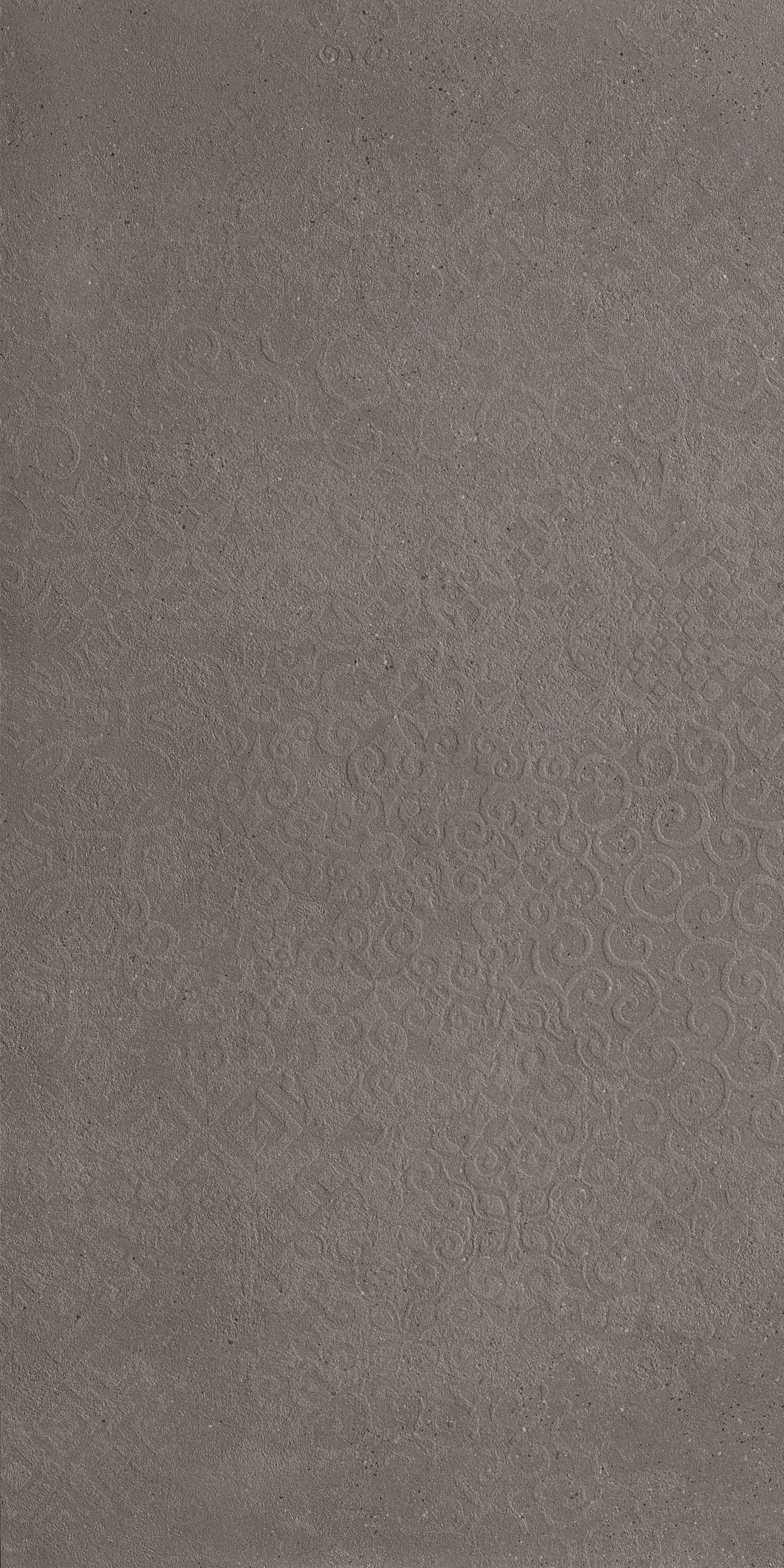 Dark gray porcelain tile with a matte concrete-inspired texture, subtle organic patterns, and luminous depth for refined industrial elegance.