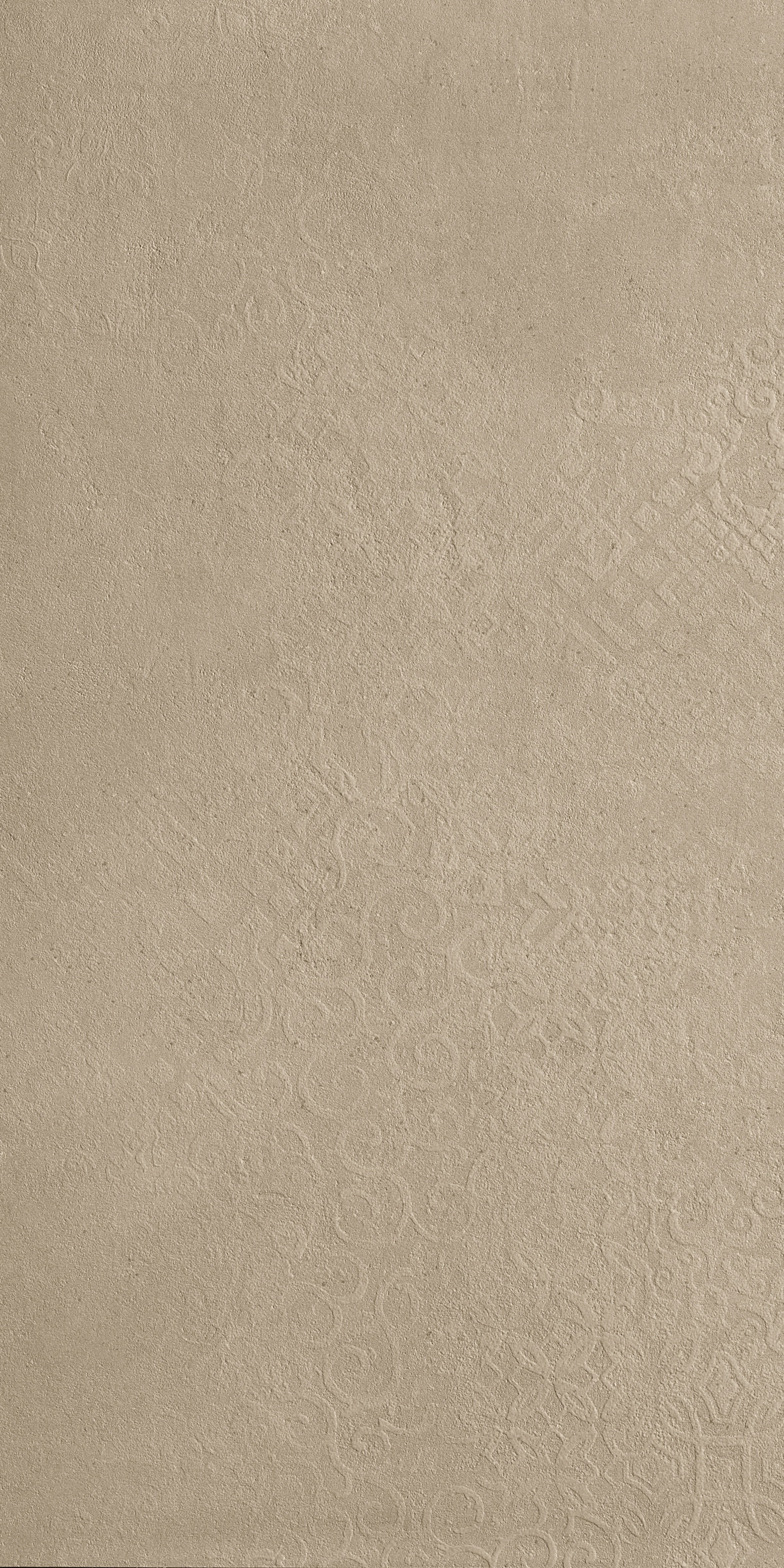 Matte porcelain tile with subtle sand-toned relief, evoking industrial elegance through delicate texture and luminous depth.
