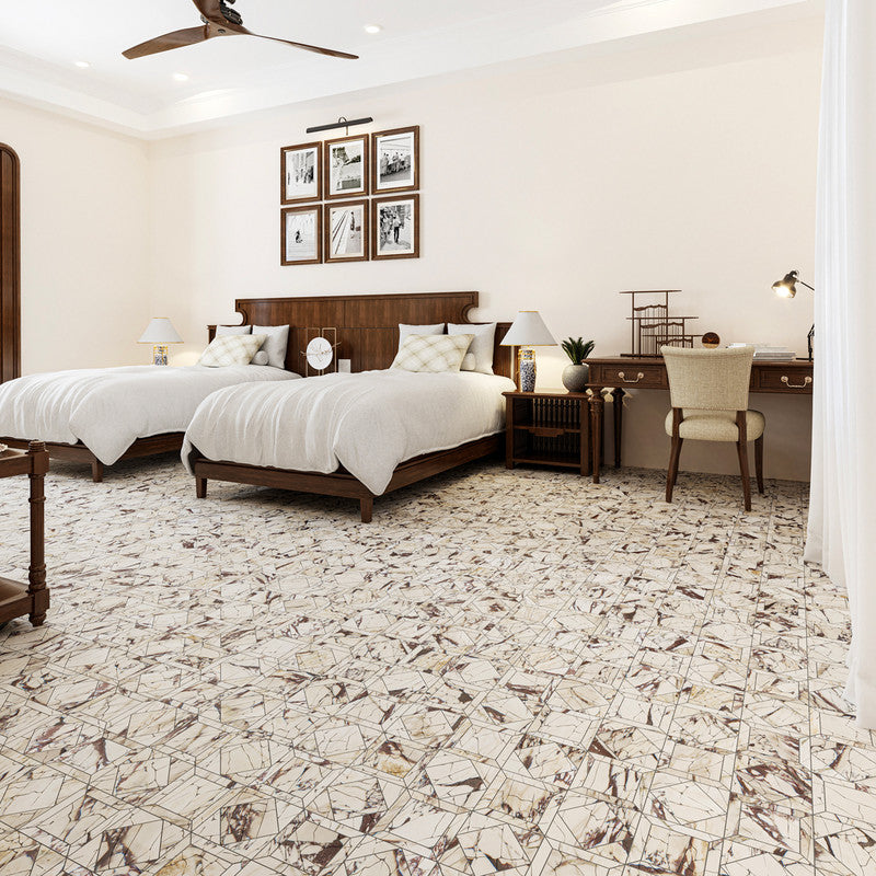 Spacious bedroom with twin beds, white linens, wooden headboards, marble tile floor, desk, bedside table with lamp, framed pictures, natural light.