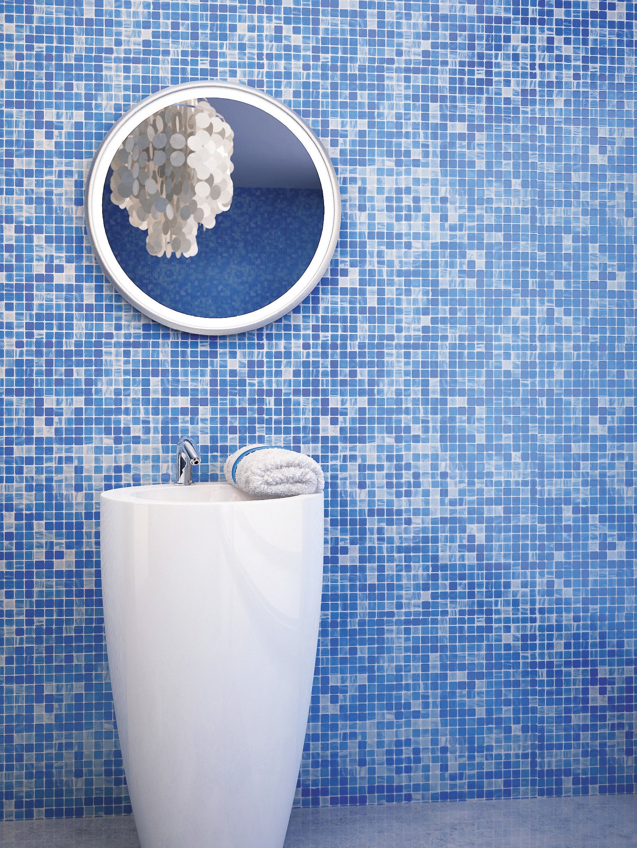 mixes glass mosaic with shades of blue and green in polished finish from surface group international.