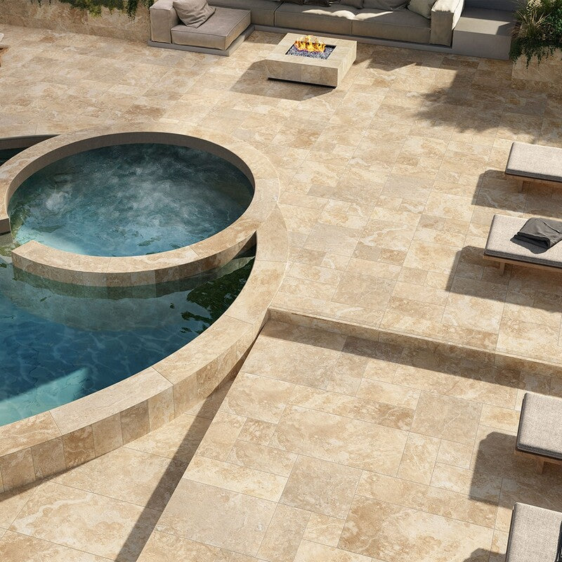 Cream porcelain paving tiles, spa pool, fire pit, lounge chairs, outdoor furniture, greenery.