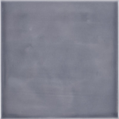 Glossy graphite gray ceramic tile from the ADEX Habitat Collection showcasing subtle color variations and smooth texture.