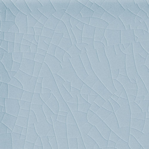 Stellar blue ceramic tile with subtle crackled texture effect for flooring or wall decor.