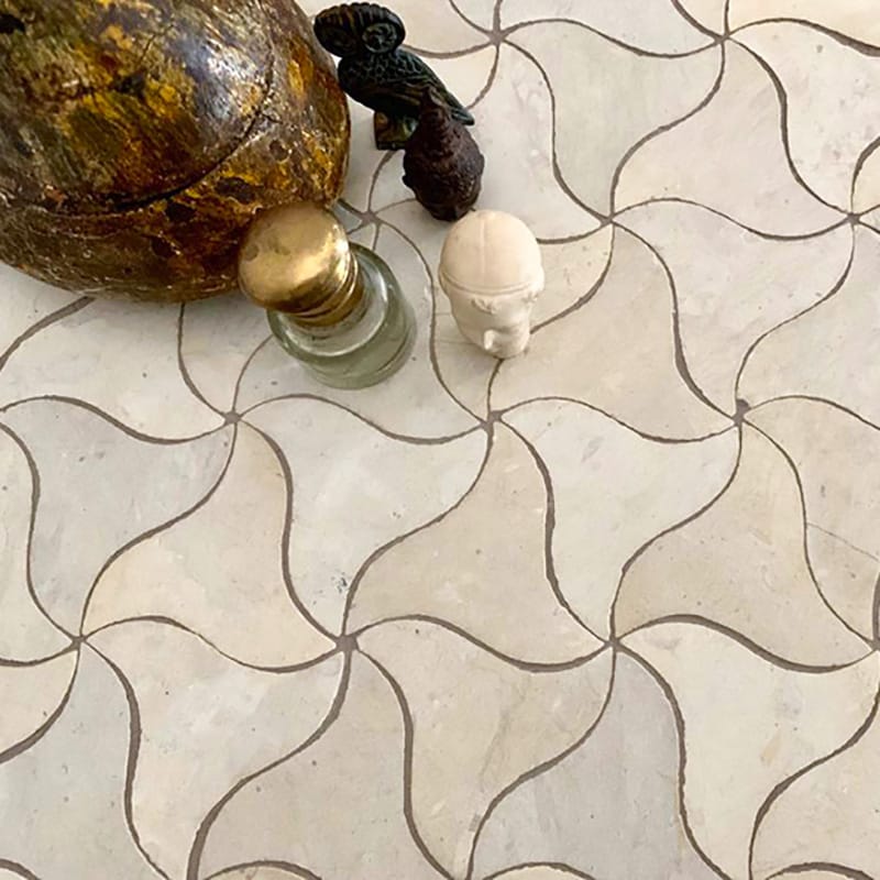 Beige limestone mosaic interior by Surface Group adds natural elegance to any space.