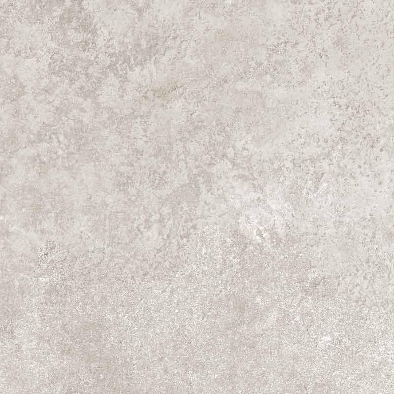 A close-up of a beige porcelain tile with subtle variations in color and a slightly mottled, textured surface resembling natural limestone. |