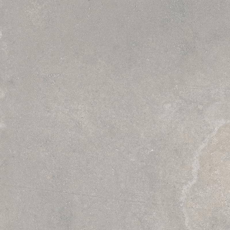 A close-up view of a textured porcelain tile with a nuanced mix of light to medium shades of gray and subtle hints of white and beige, suggesting a natural stone-like appearance.