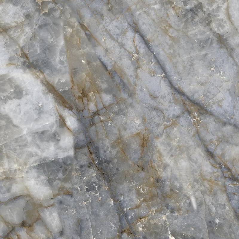A close-up of a porcelain tile with a marble-like pattern. The design features a blend of white and light gray tones with subtle golden veins throughout.
