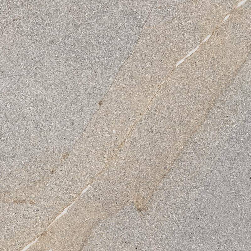 A close-up of a porcelain tile with a realistic stone-look design, featuring a subtle blend of light beige and cream colors with fine grain detailing and sporadic darker veining across the surface.