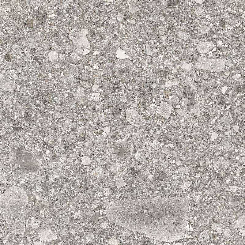 Close-up of a textured porcelain tile with a detailed stone-like pattern consisting of various shades of gray and speckles of white with occasional lighter and darker flecks that mimic natural stone.