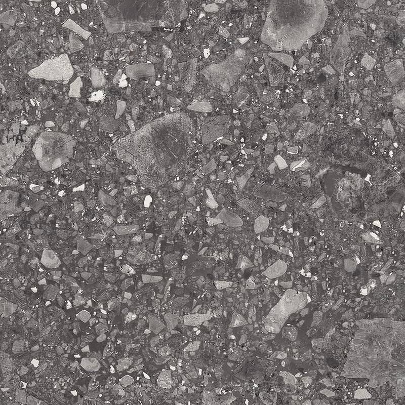 Close-up of a porcelain tile with a terrazzo-like appearance, consisting of a speckled pattern with varied shades of grey and white fragments on a darker grey background. |
