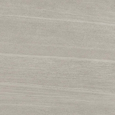 A close-up view of a porcelain tile with a subtle linear pattern, featuring a blend of light and dark shades of greige, a color between gray and beige.