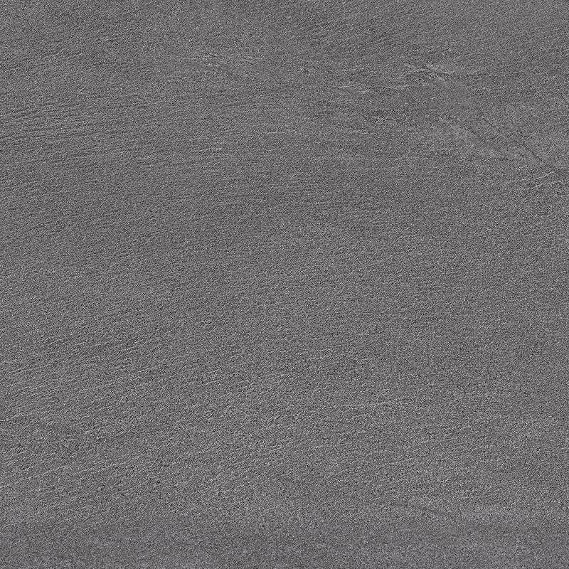A close-up view of a textured porcelain tile with a stone-like appearance, featuring dark gray tones and subtle patterns that mimic natural stone variations. |