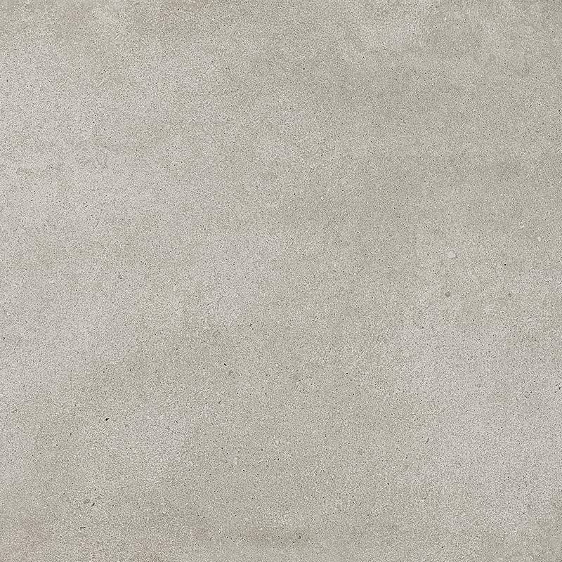 A high-resolution image of a porcelain tile with a concrete grey appearance, showcasing subtle textures and variations in shading. |
