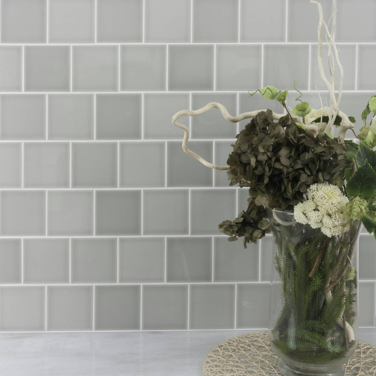 gray ceramic tile wall covering in restaurant interior