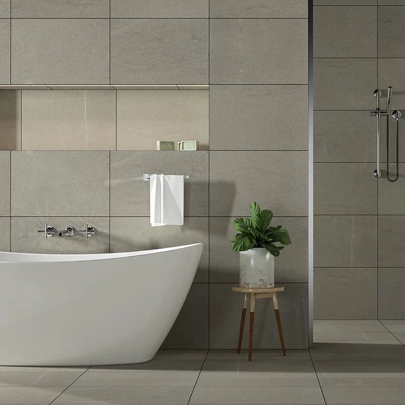 bathroom wall and floor interior made with natural limestone tile sold by surface group