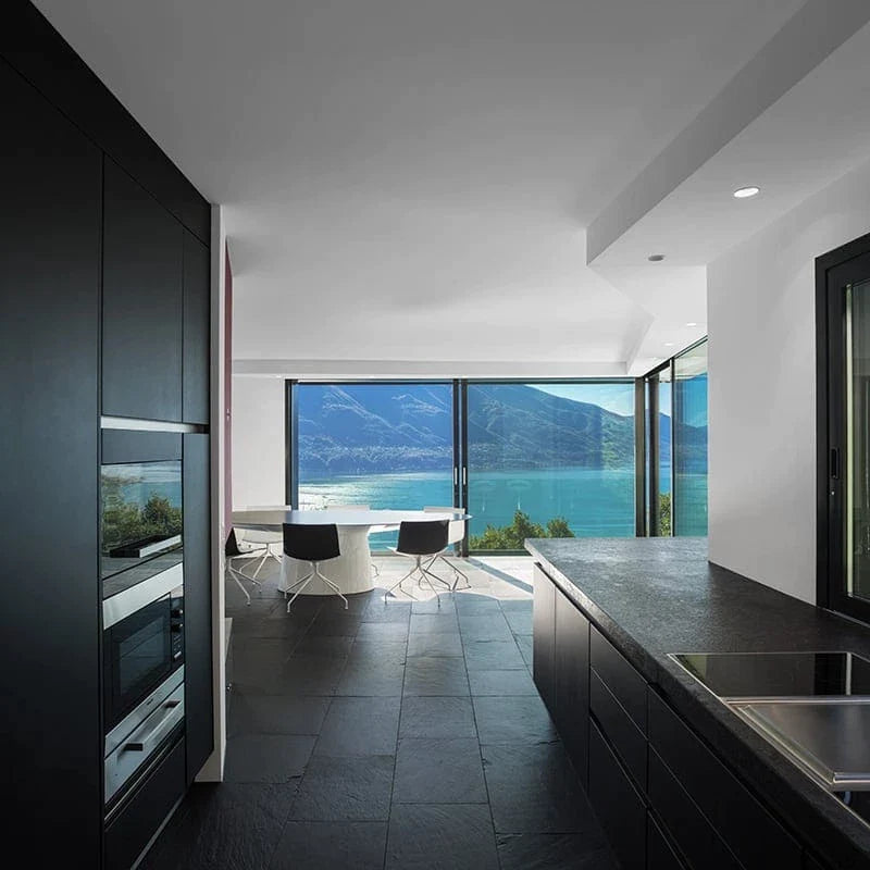 kitchen interior with slate tile floor sold by surface group international