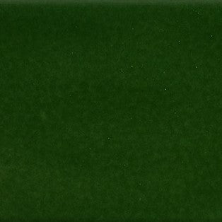 Emerald green ceramic tile with smooth texture and subtle shade variations for a luxurious finish.