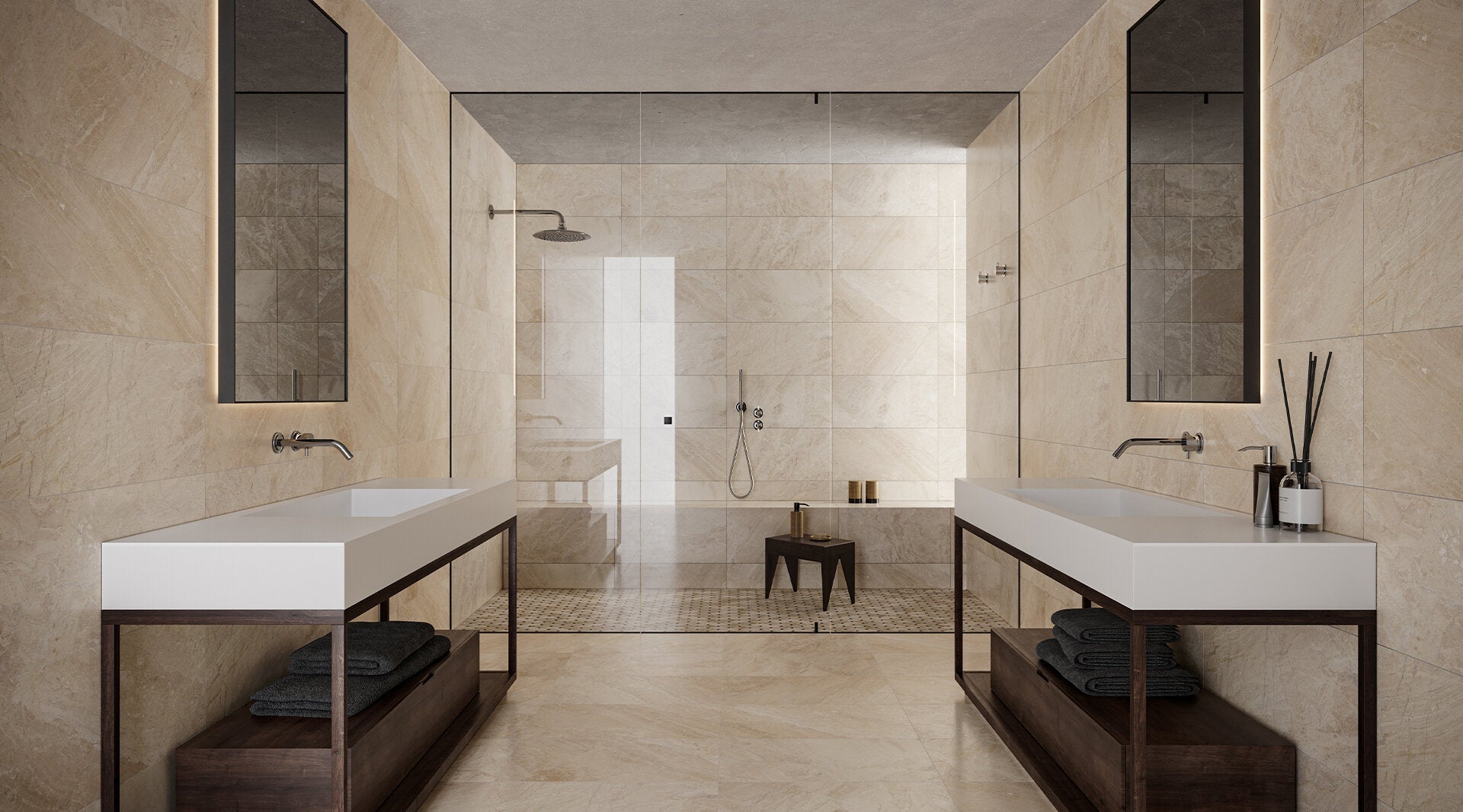 Elegant modern bathroom featuring Anatolia Industria porcelain tile collection with beige marble effect on walls and floor, dual white vanities, and walk-in shower.