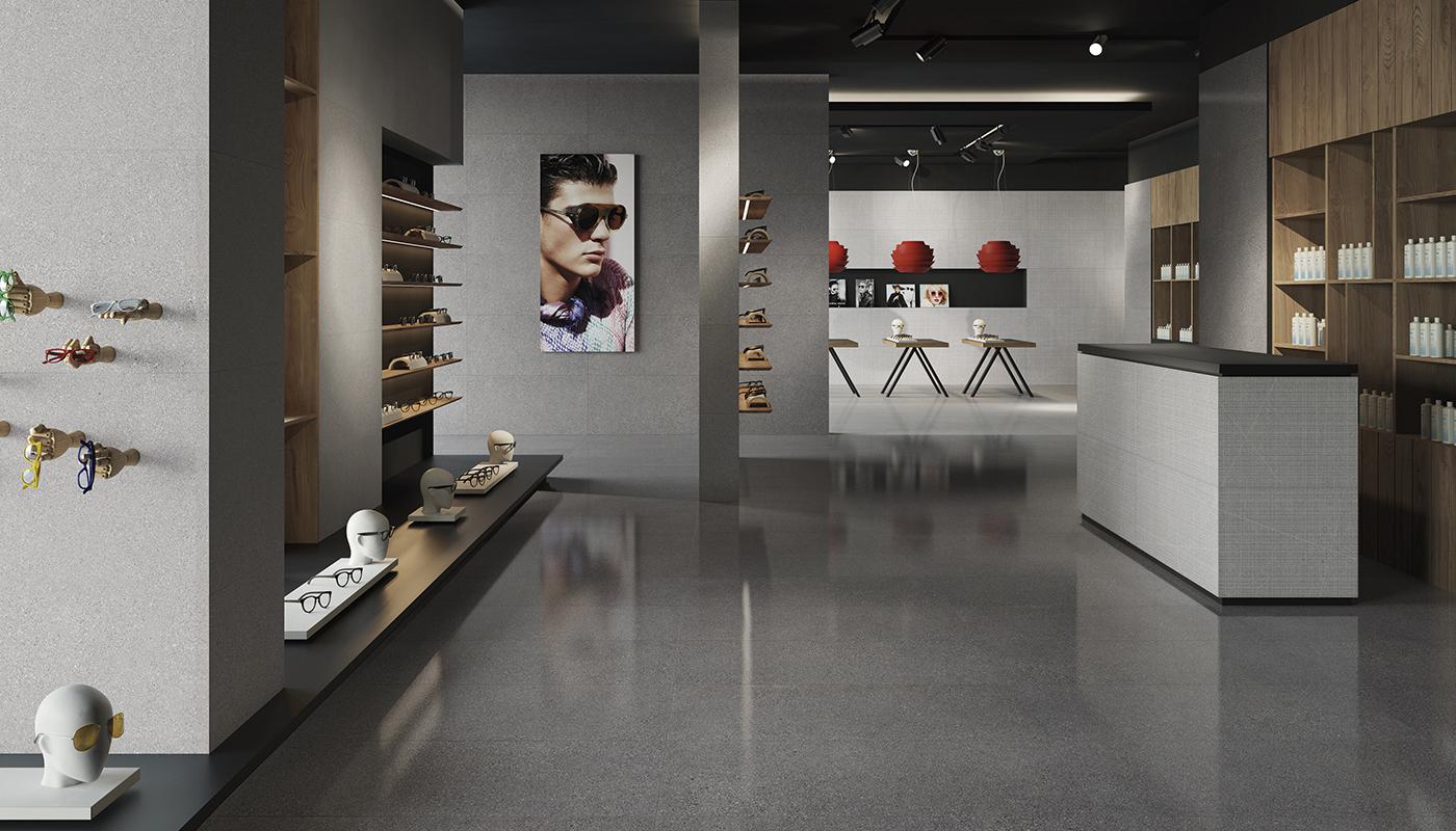 Modern interior design showroom featuring Emil Ergon Grain Stone Italian porcelain tile flooring with elegant furniture and decorative items