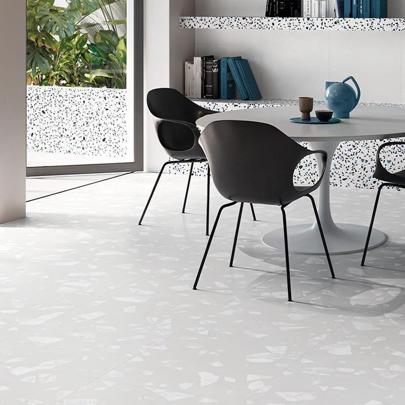 kitchen floor with terrazzo look porcelain with table, chairs and the glass door