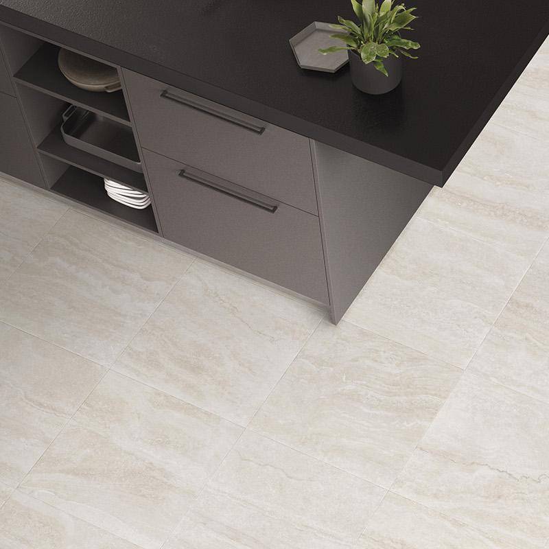 Beige travertine stone look porcelain tile flooring in modern kitchen setup