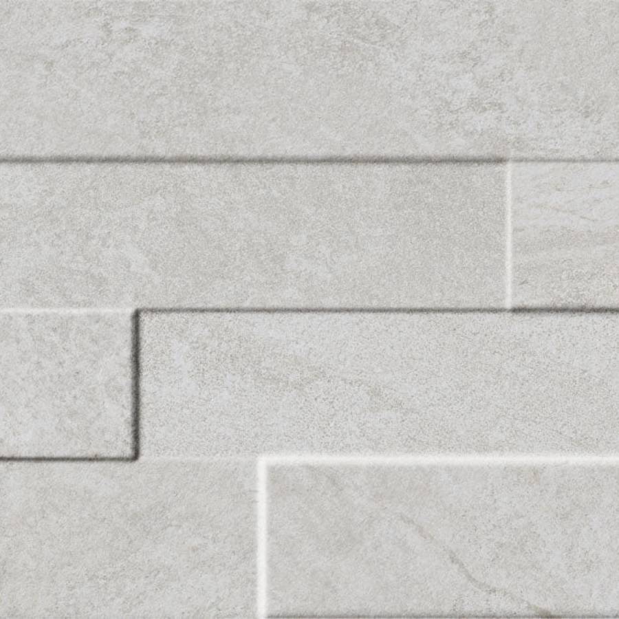 Porcelain ledgestone tile in arctic white color with textured finish.