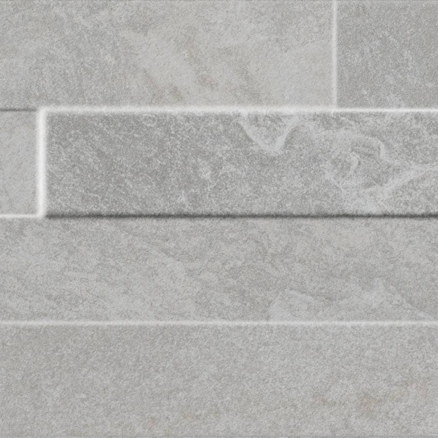 Porcelain ledgestone tile in varying shades of gray with a textured finish.