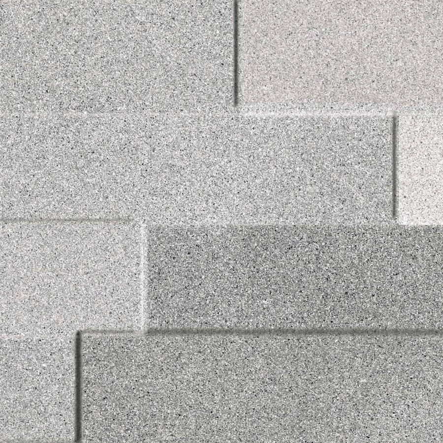 Porcelain ledgestone tile in varying shades of gray with a textured finish.