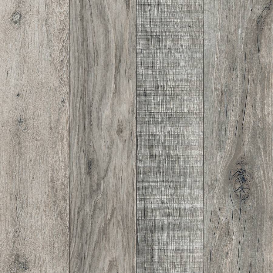 Porcelain tile with wood and fabric textures in gray tones.