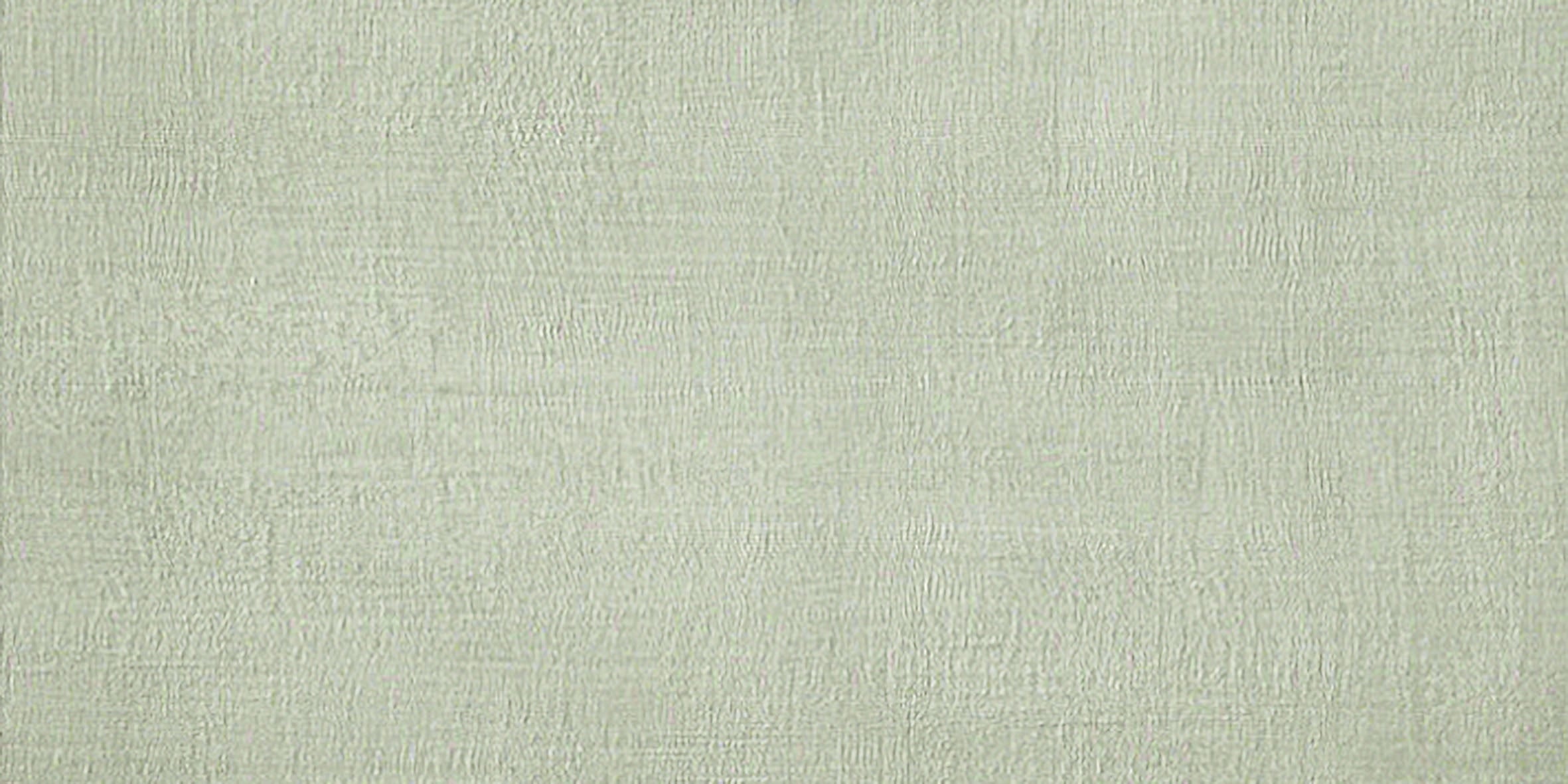 Soft green porcelain tile with a linen-like texture and timeworn matte finish, evoking delicate elegance and organic warmth.