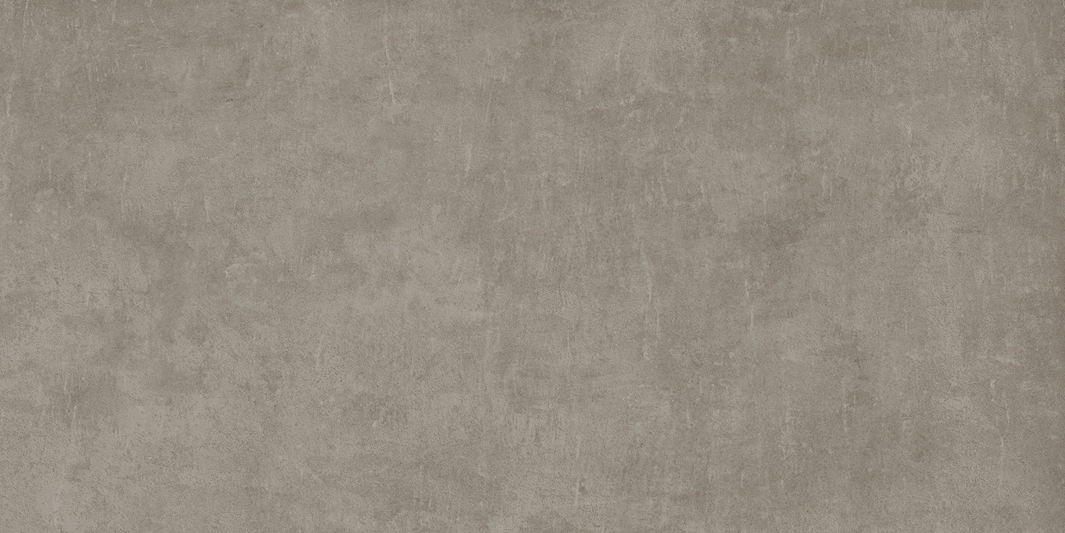 Matte gray porcelain tile with handcrafted concrete look, delicate reliefs, and urban sophistication for refined modern spaces.