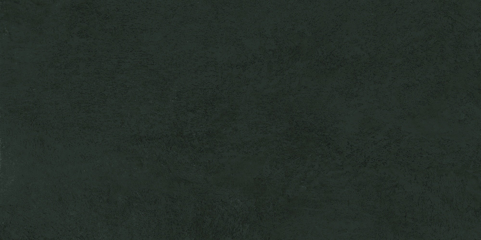 A deep black porcelain tile with a smooth matte finish, evoking raw earth and timeless elegance for serene, grounded interiors.