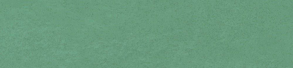 Smooth matte jade green porcelain tile with raw earth texture, evoking serene harmony and timeless organic elegance.