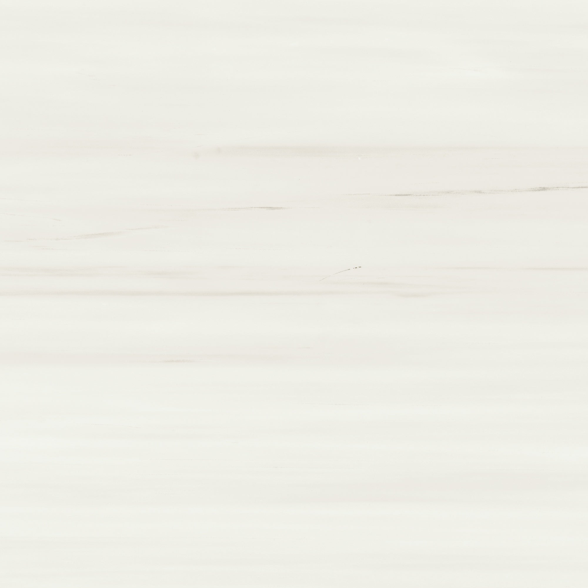 Luxurious warm white porcelain paving tile with delicate dolomite-inspired veins and a refined matte finish for timeless elegance.
