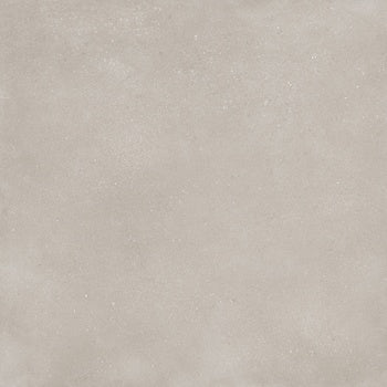 Matte white porcelain tile with a soft, earthy texture, evoking sedimentary rock and sand in a contemporary minimalist design.