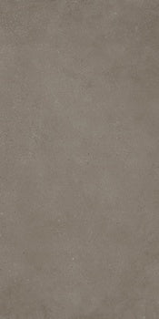 Rectified matte porcelain tile in dark beige, evoking sedimentary rock with a sleek, minimalist earth-toned surface.