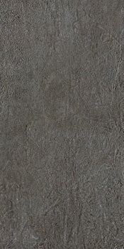 Dark gray porcelain tile with a refined concrete effect, matte finish, and elegant urban sophistication for modern interiors.